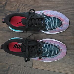 Women's gently used Nike Odyssey React sneakers.